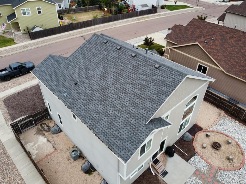 Above and Beyond: Ensuring Safety with Expert Roof Repair Expert Roof Repair Services in Colorado Springs - Professional Roofing Team at Work